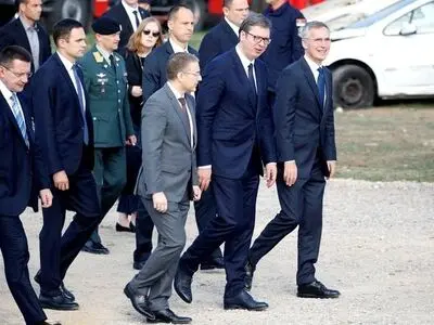 Ahead of NATO summit, Serbia buffeted between West and Russia