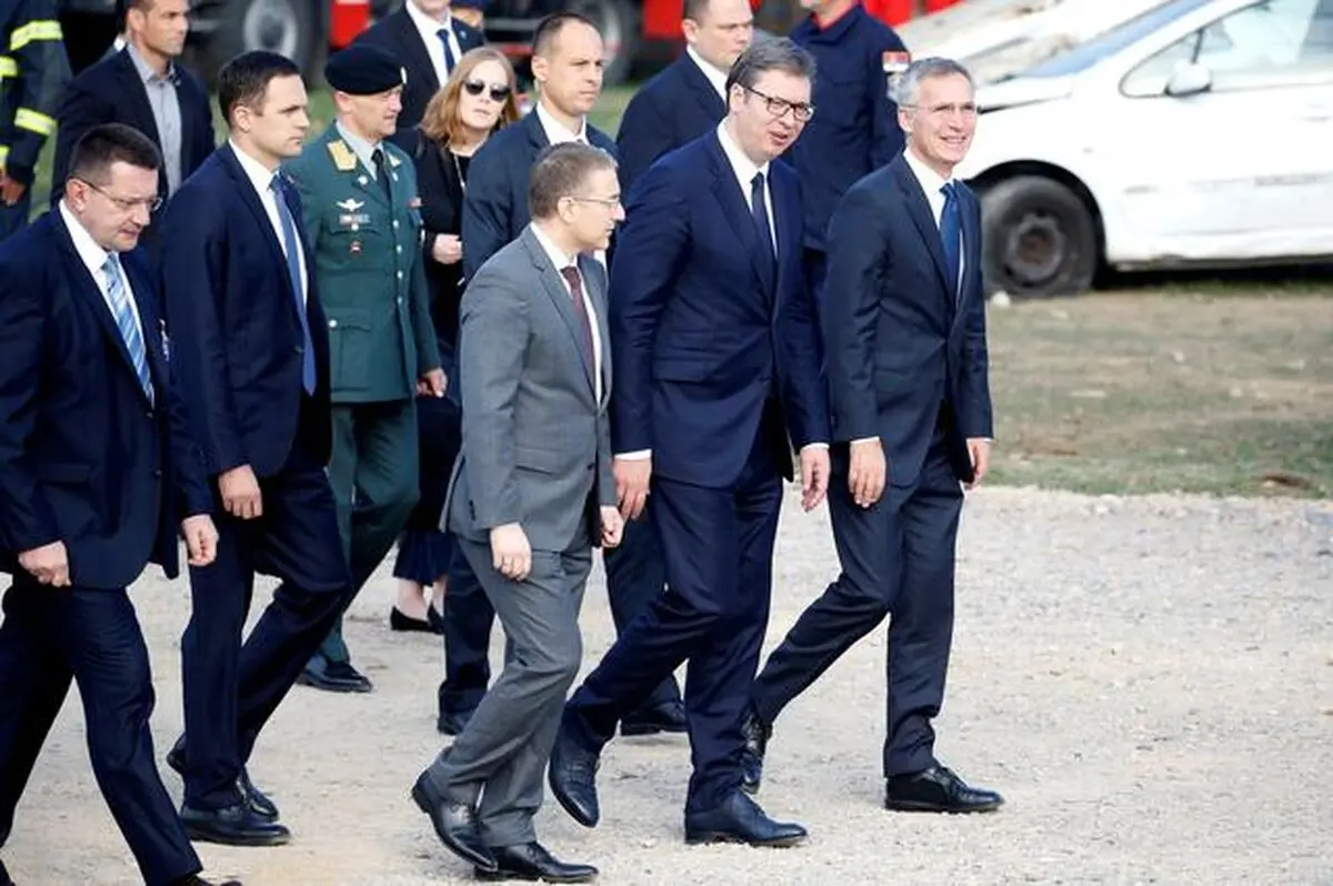 Ahead of NATO summit, Serbia buffeted between West and Russia