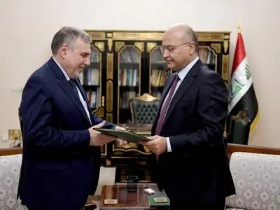 New Iraq PM appeals to the masses but is rejected by protesters