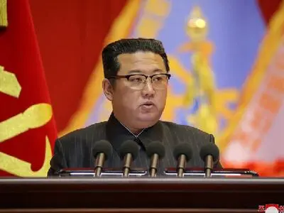 North Korea's Kim talks food not nukes for 2022