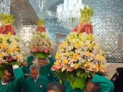 گل آرایی حرم حضرت معصومه (س) در آستانه ولادتشان+ فیلم