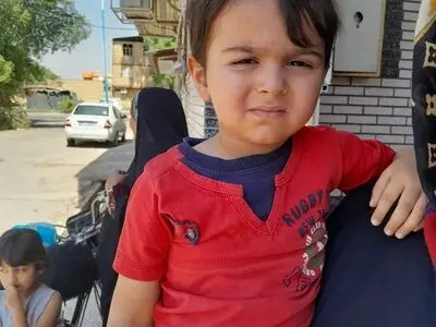 نجات کودک چهار ساله از میان دود و آتش در شوش