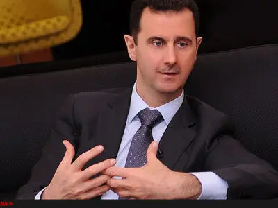اسد نشان اهدایی فرانسه را پس داد + عکس