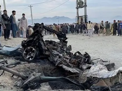 Afghan school blast toll rises to 58, families bury victims