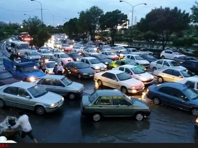 واکنش کاربران به کاپشن ایتالیایی قالیباف و آب‌گرفتگی خیابان‌های تهران