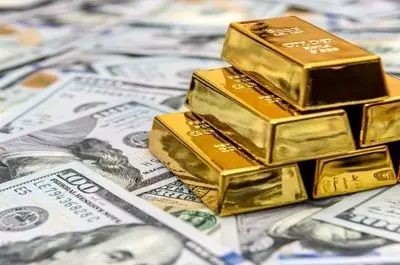 دوئل طلا و دلار در بازارهای جهانی؛ نگاه سرمایه‌گذاران به گزارش فدرال رزرو