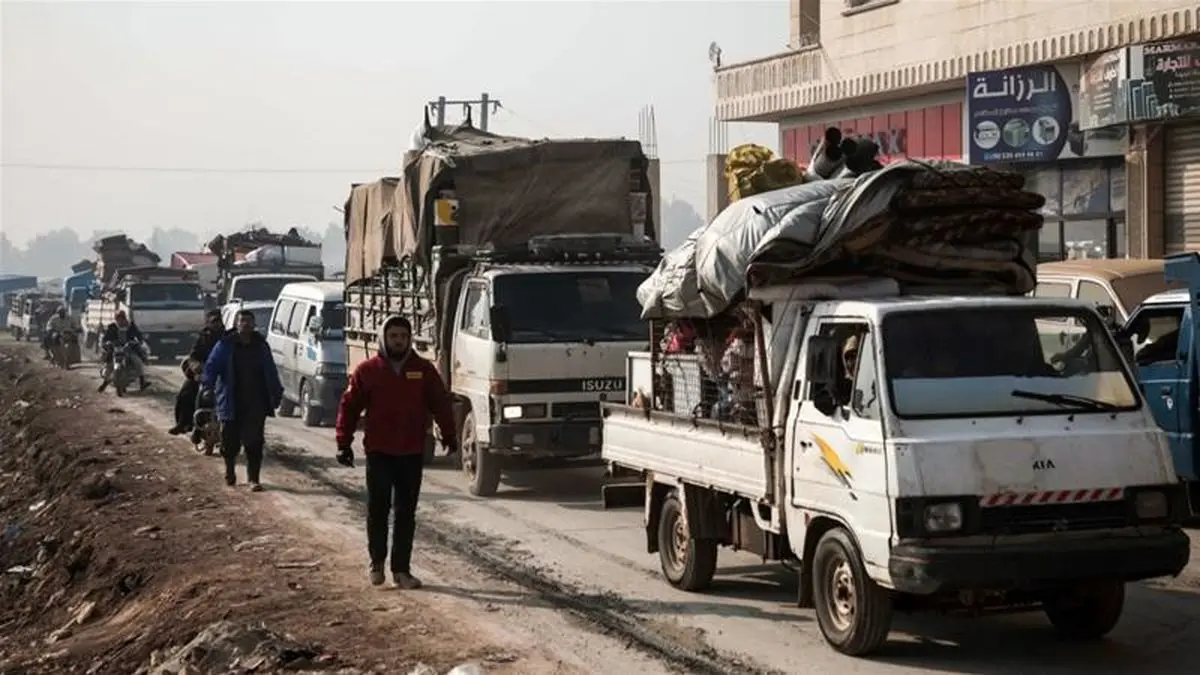 Tens of thousands flee as Syrian forces continue Idlib advance