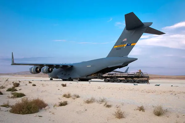 US military plane carrying weapons lands at Syria