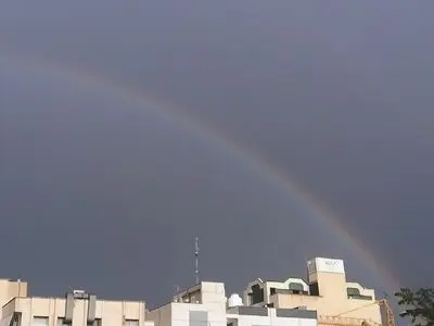 عکس : رنگین کمان زیبای بهاری در تهران 
