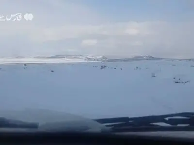 بارش برف یک جادهٔ روستایی در خراسان‌جنوبی را ناپدید کرد + فیلم