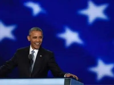 Obama urges Americans to get behind Clinton, slams Trump