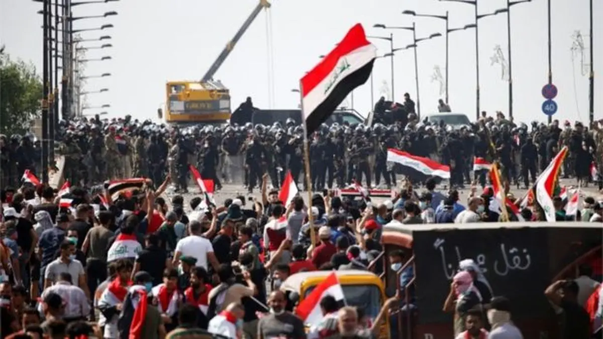 Iraq protests: Crowds descend on Baghdad square defying curfew