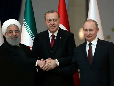 Iran, Russia, Turkey discussed non-dollar trade at summit in Tehran