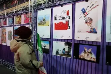 نمایشگاه کاریکاتور «جنگ تحمیلی سوم» در میدان ساعت تبریز برپا شد