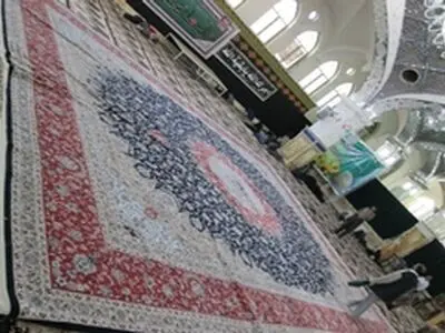 گلبوته‌های فرش دستبافت خادمین حرم مطهر شهید اردهال جایگزین غبار عزاداران قالیشویان اردهال شد