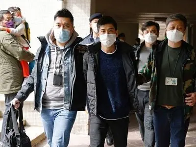 Dozens of HK democracy activists arrested under security law as crackdown intensifies