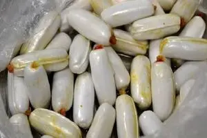 معده قاچاقچی، انبار تریاک