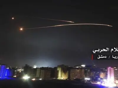 Syria air defences 'confront Israeli missiles' near Damascus