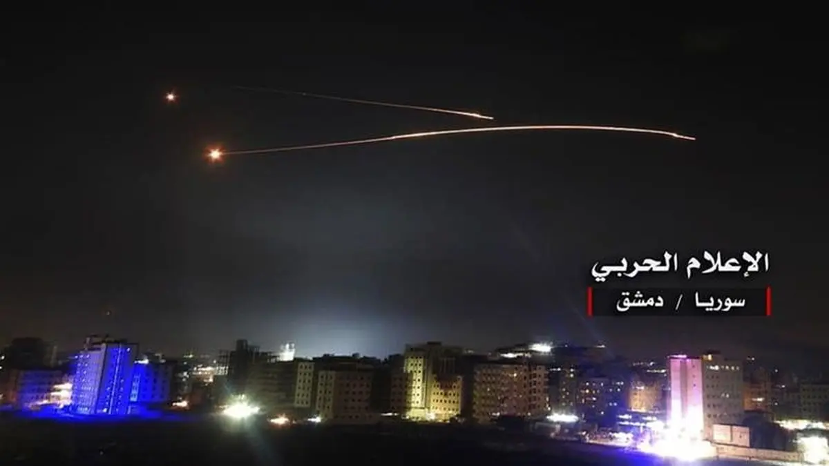 Syria air defences 'confront Israeli missiles' near Damascus