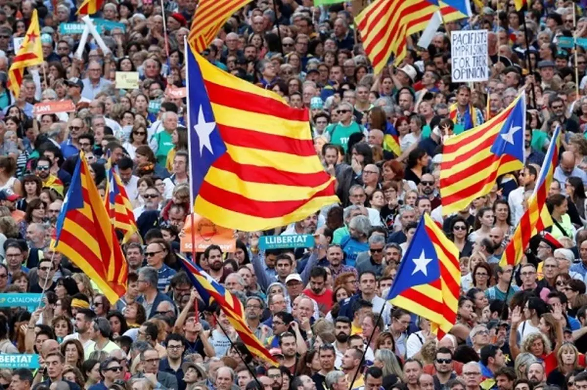 Catalonia's leaders fight off direct rule from Madrid