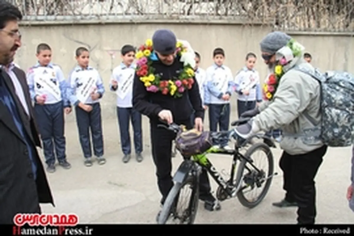 حضور دوچرخه سوار جانباز در همدان با پیام «قهرمان زود خوب شو»