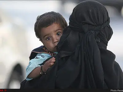 روزگار زنی کشاورز که سر چهارراه اسپند دود می‌کند