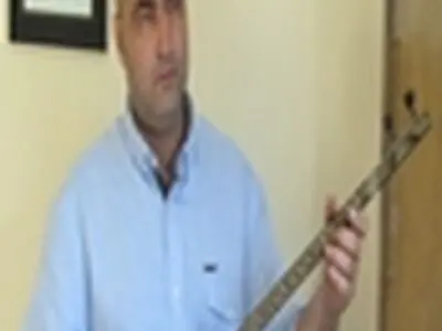 پیکر رحمان مرادی از مقابل تالار وحدت تشییع می‌شود