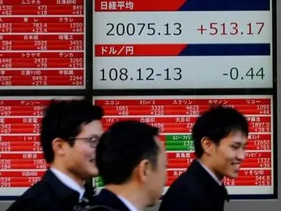 Asian stocks recover on firmer futures, retreat in U.S. yields