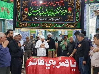 پرچم اهدائی آستان مقدس حضرت عباس«ع» به بندر امام خمینی رسید