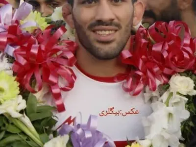 مراسم استقبال از کشتی‌گیر جوان و شایسته ایذه ای+ تصاویر