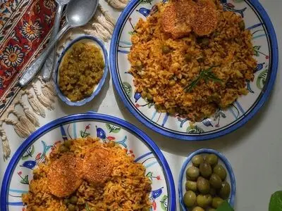 طرز تهیه پلوی نخود فرنگی با مرغ ریش ریش شده