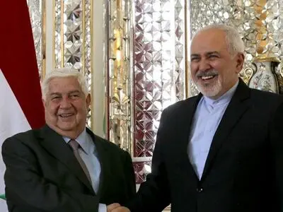 وزیر الخارجیة الایرانی یجری اتصالا مع ولید المعلم