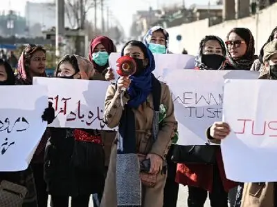 Afghan women call for rights, protest alleged Taliban killings