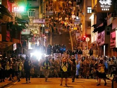 After weekend of violent clashes, Beijing to address Hong Kong unrest