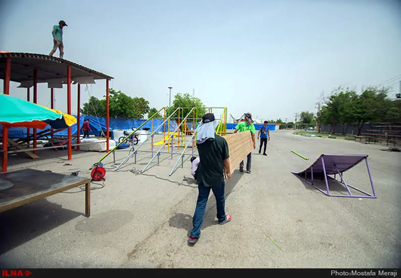 تلاش شبانه روزی برای آماده سازی پیست حرکات نمایشی "تاپ رایدر"، در پارک دولت شهر دزفول