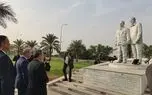ادای احترام عراقچی به شهیدان سردار سلیمانی و ابومهدی المهندس
