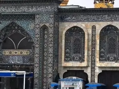 تصاویری از بارش باران در بین‌الحرمین کربلا