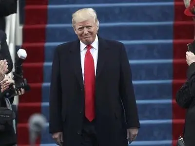 Trump signs revised travel ban in bid to overcome legal challenges