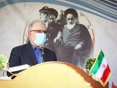 وزیر بهداشت زنگ انقلاب را در یکی از مدارس بم نواخت