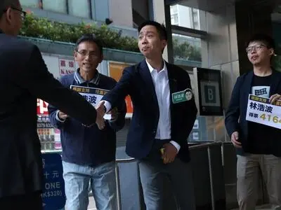 Landslide democratic win in HK election raises pressure on city's leader