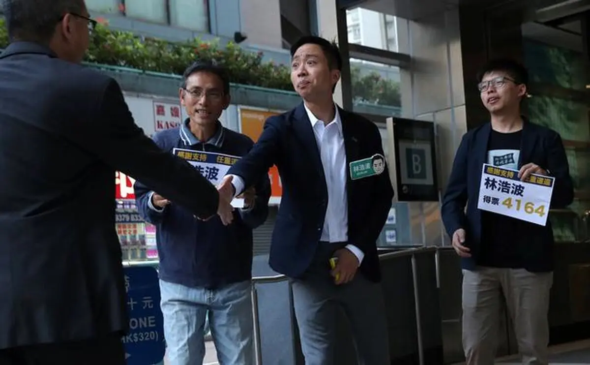 Landslide democratic win in HK election raises pressure on city's leader