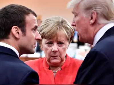 Merkel could join Macron in Davos for epic clash with Trump
