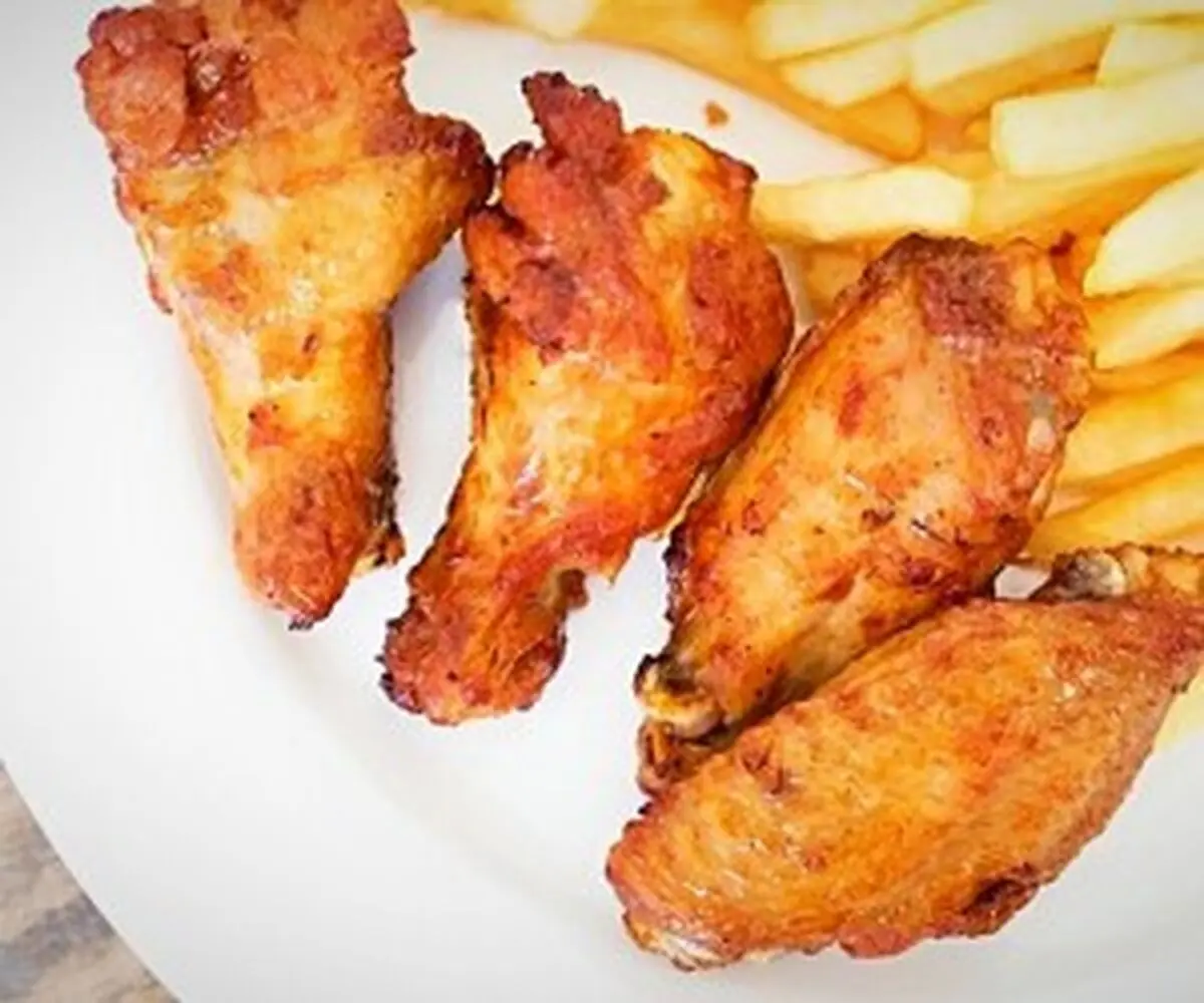 آشنایی با خطرات و عوارض خوردن بال و گردن مرغ