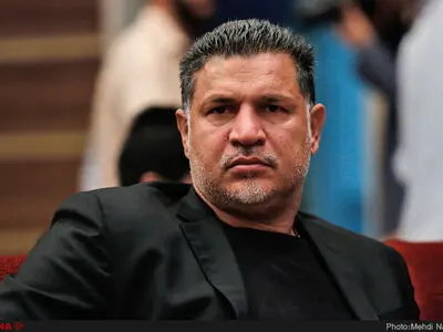 علی دایی مدل گالری لباس همسرش شد+عکس