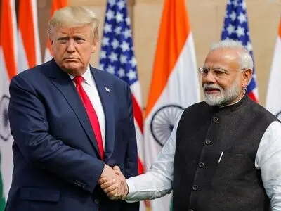 After raucous welcome in India, Trump set for talks on trade, arms deals