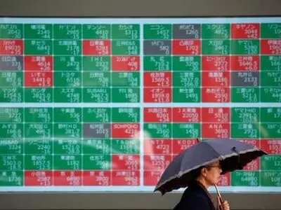 Asia shares wary of Trump, wait on U.S. inflation