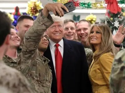 In a first, Trump makes surprise visit to U.S. troops in Iraq