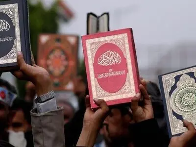 Denmark passes law to ban Holy Quran burnings