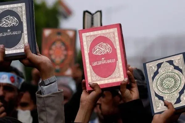 Denmark passes law to ban Holy Quran burnings