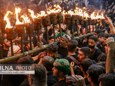 آیین مشعل گردانی نجفی های مقیم تهران در شب تاسوعا